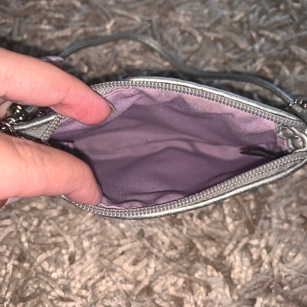 Coach Signature Wristlet in Metallic Purple